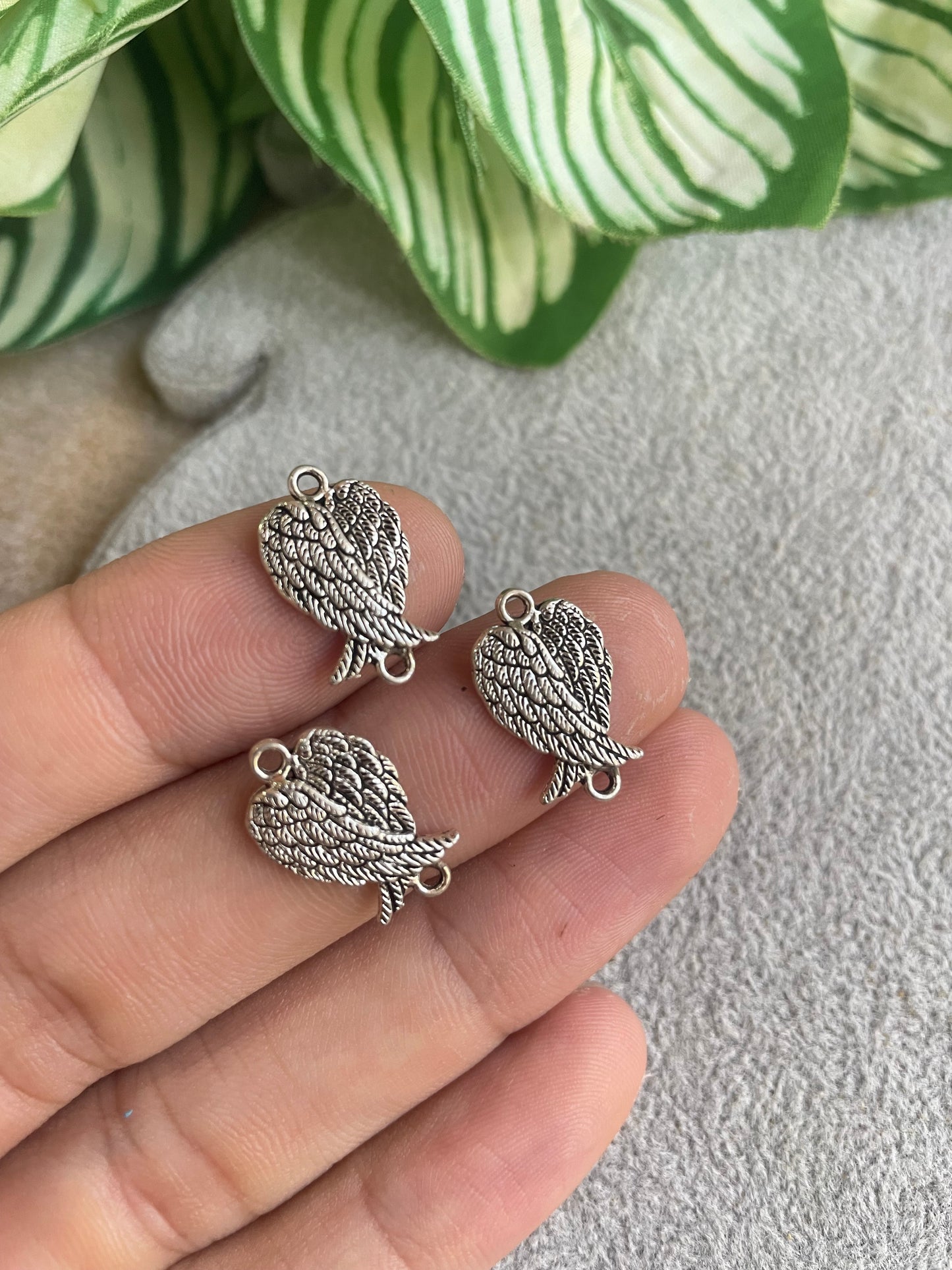 Enlace de alas de pewter