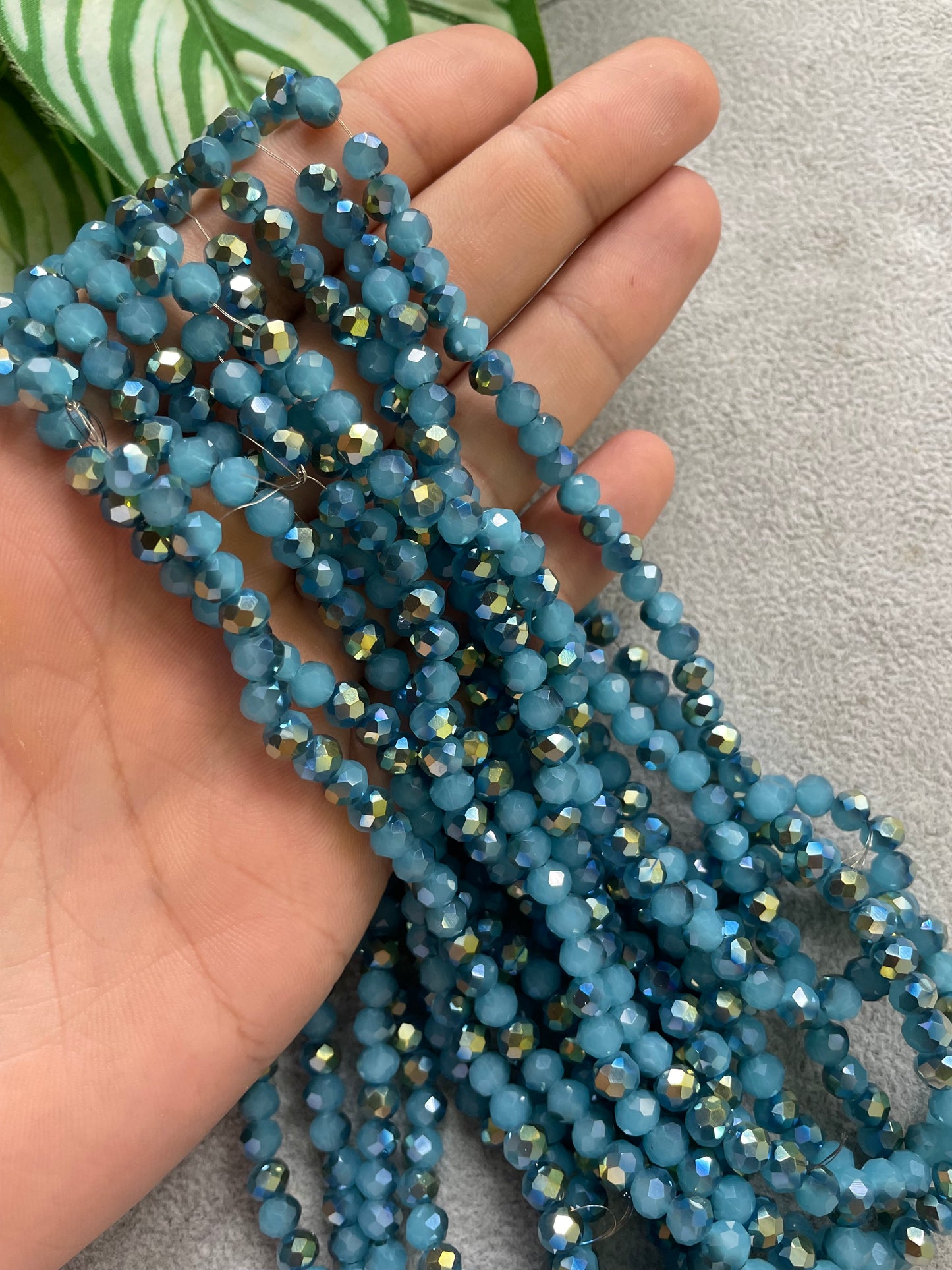 Cristal rondelle turquesa + tornasol 6mm