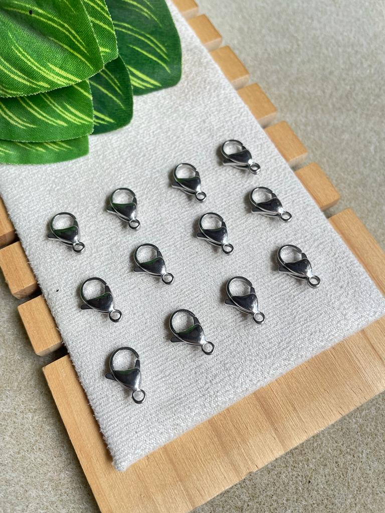 Broche de perico plateado en acero inoxidable