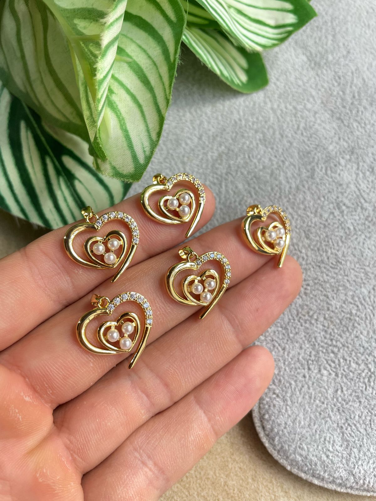 Dije de corazón con perlas