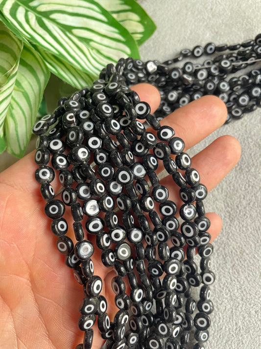 Ojo turco negro plano 8mm