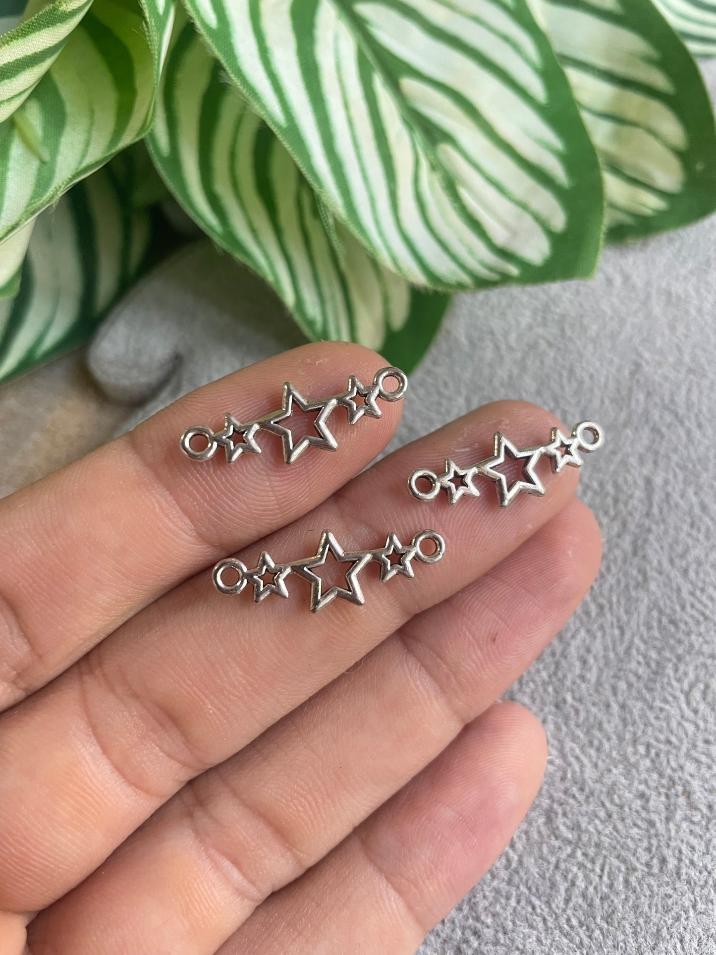 Enlace de estrellas de pewter