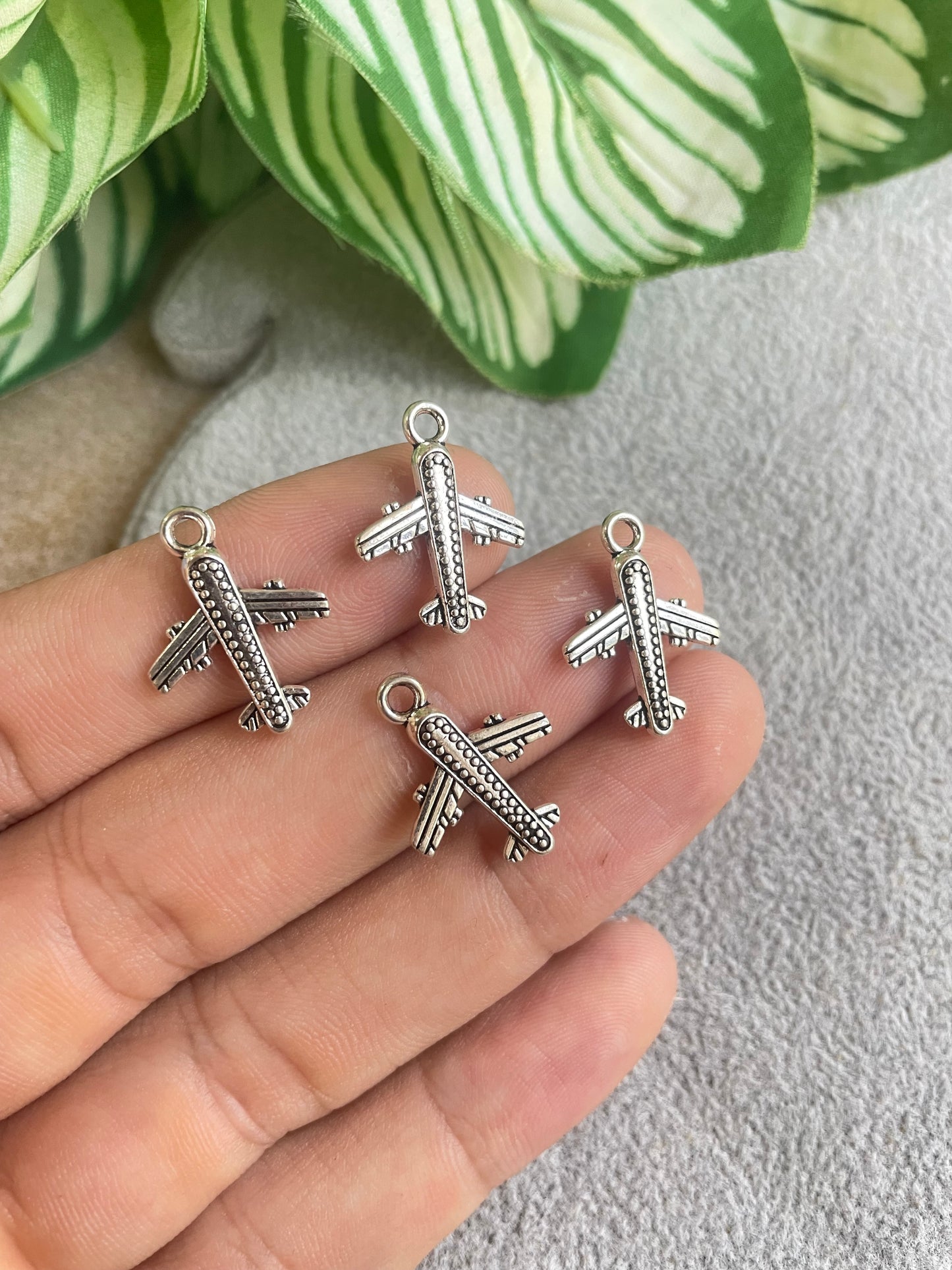 Dije de avión de pewter