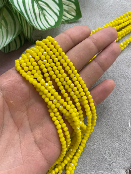 Cristal rondelle amarillo 4mm