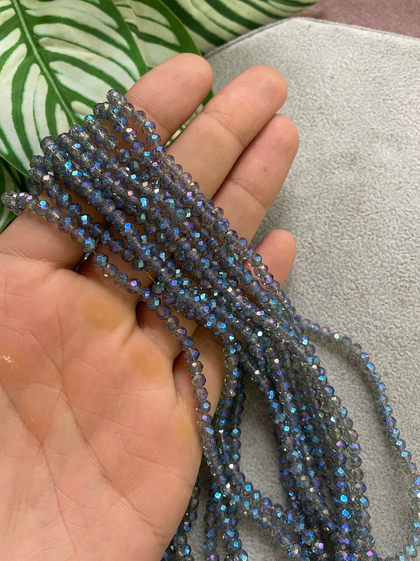 Cristal rondelle azul ahumado 4mm